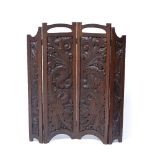 Arts and Crafts folding firescreen or draught screen with carved decoration, oak 79cm high