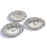 Three Siamese white metal dishes with engraved decoration and indistinct marks to the underside 17cm