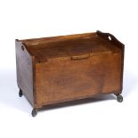 Ambrose Heal for Heals ottoman or blanket box on castors, circa 1910, oak 77cm wide x 52cm high x