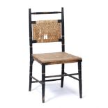 Attributed to William Watt, after E. W. Godwin ebonised chair with raffia inset back 85cm high Note: