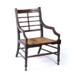 In the Manner of Edward William Godwin (1833-1886) elbow chair with raffia seat, aesthetic
