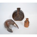 Collection of studio pottery to include: a modelled helmet, vase and one other vase measures 24cm