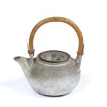 Studio pottery teapot with bamboo handle stamped 'French Pottery, Richmond, Yorks' to the base