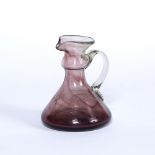In the manner of Christopher Dresser (1834-1904) Clutha style jug, purple and clear glass unmarked