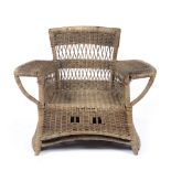 Dryad child's chair, wicker with label to the reverse 69cm wide x 55cm high x 36cm deep