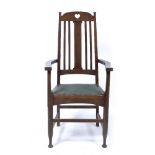 After George Walton (1867-1933) elbow chair, oak, Arts and Crafts style 113cm high