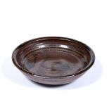 Ray Finch (1914-2012) for Winchcombe Pottery iron glazed shallow bowl with trailed decoration