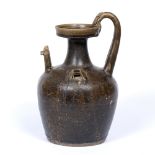 Glazed ewer Chinese, Jin dynasty with double headed chicken spout and reeded handle 27cm high