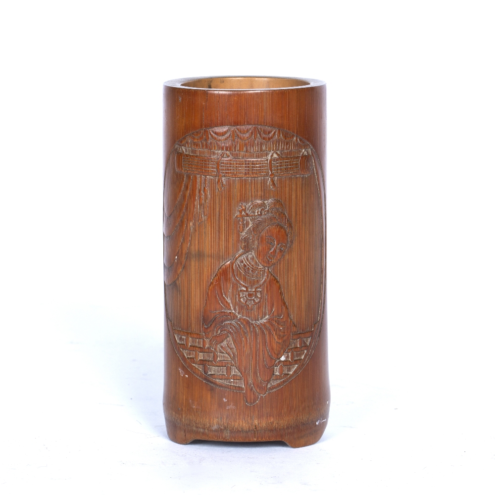 Bamboo brush vase Chinese, 19th Century carved in low relief with an oval window framing a court