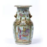 Canton vase Chinese,19th Century painted in famille rose enamels with panels of courtiers surrounded