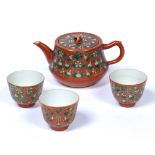 Porcelain tea set Chinese, 19th Century decorated in ground coral red, with melons painted around