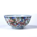 Wucai porcelain bowl Chinese, 19th Century the centre painted with a dragon chasing flaming