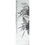 Xu Zonghao (1880-1957) orchids growing on rocks, scroll, ink on paper with artists seal mark 92cm