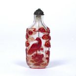 Overlaid glass snuff bottle Chinese, 19th Century decorated with overlaid red decoration depicting a