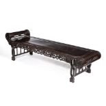 Hardwood Luohan day bed Chinese, circa 1900 with carved foliate scroll end and open supports 190cm x