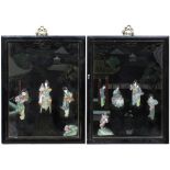 Pair of black lacquer plaques Chinese, 20th Century each with porcelain mounts and both panels