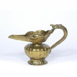 Oil lamp Nepalese, 19th Century on a conical foot, with ribbed body, the handle modelled as a