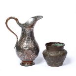 Qajar silvered pitcher Persian with engraved decoration depicting figures in a forest, with floral