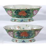 Pair of polychrome quatrefoil pedestal bowls Chinese, 19th Century each with flowering magnolia,