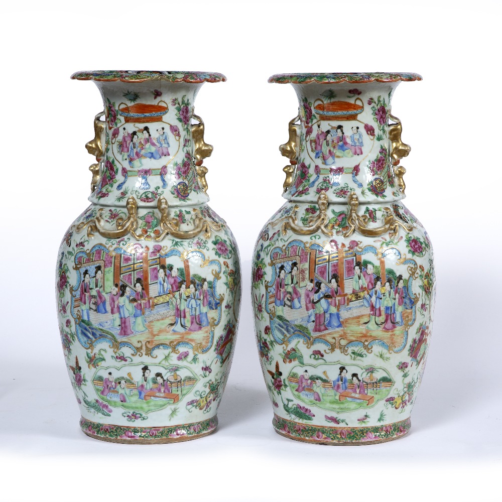 Pair of Canton polychrome vases Chinese,19th Century each painted with a panel of courtiers,within a