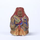 Nara-bori polychromed netsuke Japanese, late Meiji of a standing figure of Shojo holding a fan