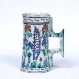 Iznik tankard Turkish, 18th/19th Century of waisted form with polychrome painted foliate ottoman