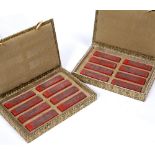 Cased set of 16 ink stones Chinese decorated in red, carved depicting terrace scenes to one side,