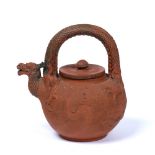 Yixing teapot Chinese with a dragon handle, signed Jingue 23cm high