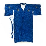 Blue silk robe Chinese, 20th Century with gold metal thread of a swooping bird to the back