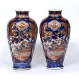 Pair of polychrome Imari vases Japanese, 19th Century each of tapering baluster form, painted with