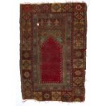 Konya rug Turkish, possibly 18th Century with traditional motifs 103cm x 146cm