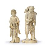 Two ivory okimonos Japanese,Meiji one carved in the form of woodsman with bird resting upon his