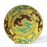 Yellow dragon saucer dish Chinese painted with aubergine and pale green dragons, Yongzheng