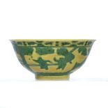 Porcelain Imperial yellow glazed bowl Chinese decorated in green enamel with children at play within