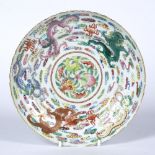 Porcelain plate Chinese decorated in polychrome colours depicting dragons in flight with a central