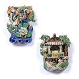 Two Swatow pottery wall pockets Chinese one in the form of a small terraced building with pond and