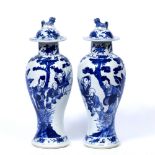 Pair of blue and white baluster vases and covers Chinese, 19th Century each painted with Long Eliza,