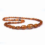 Amber necklace of graduated form 74cm long