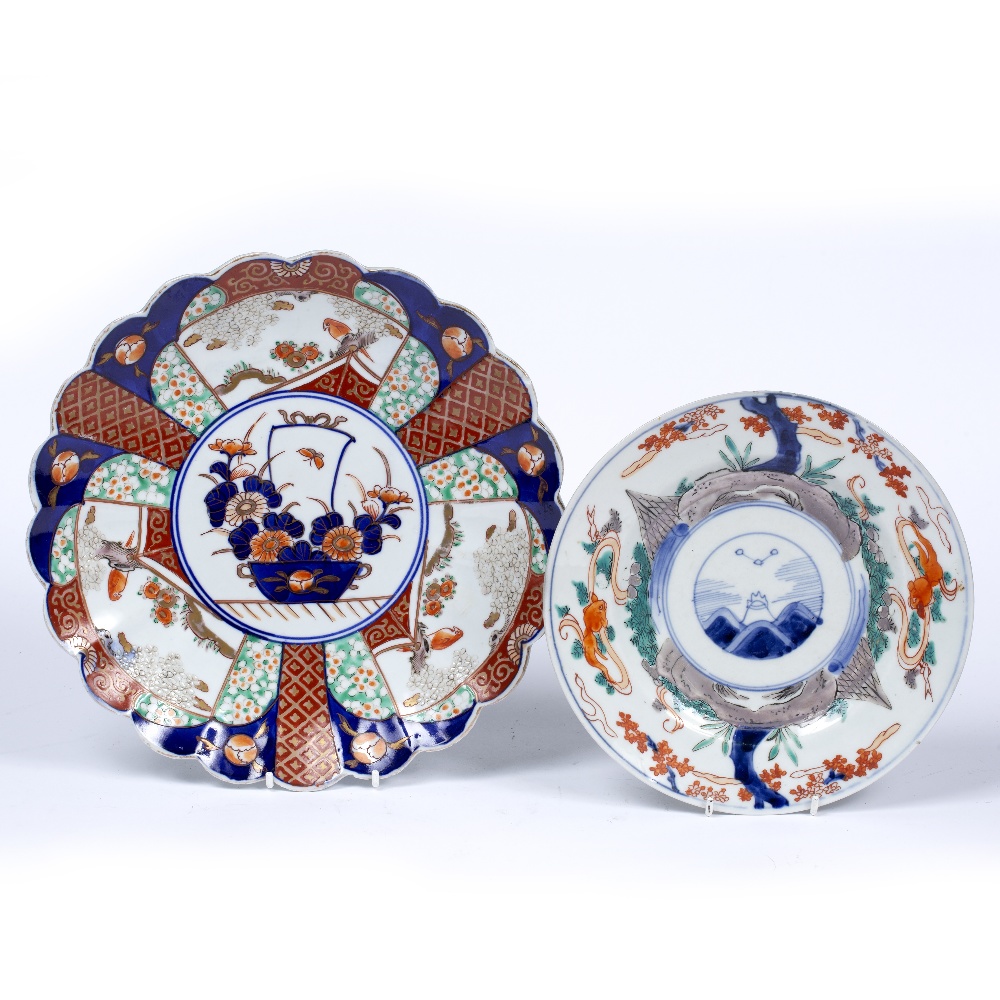 Two Imari plates Japanese, 18th/19th Century the smaller dish having iron red border and