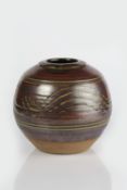 Attributed to Ray Finch (1914-2012) ovoid vase, tenmoku glaze with combed decoration 18cm high
