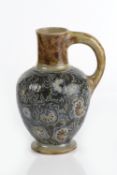 Robert Wallace Martin at Martin Brothers jug, decorated with scrolling flowers and leaves, inscribed