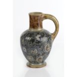 Robert Wallace Martin at Martin Brothers jug, decorated with scrolling flowers and leaves, inscribed
