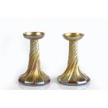 Louis Comfort Tiffany (1848-1933) pair of glass candlesticks gold iridescent finish, twisted form