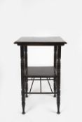 In the manner of Edward William Godwin (1833 - 1886) ebonised occasional table, with spindle
