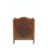 Arts and Crafts Canterbury or magazine rack, oak, with carved decoration of a dragon 52cm x 68cm x