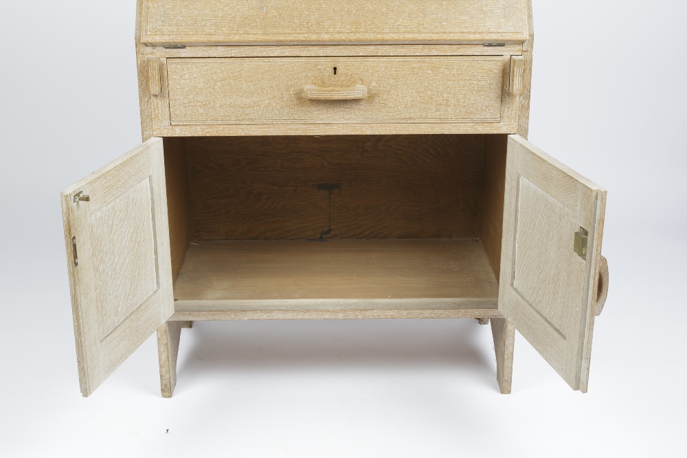 In the manner of Heals bureau, limed oak, long drawer above a cupboard, unmarked 74cm x 105cm x 42cm - Image 4 of 5