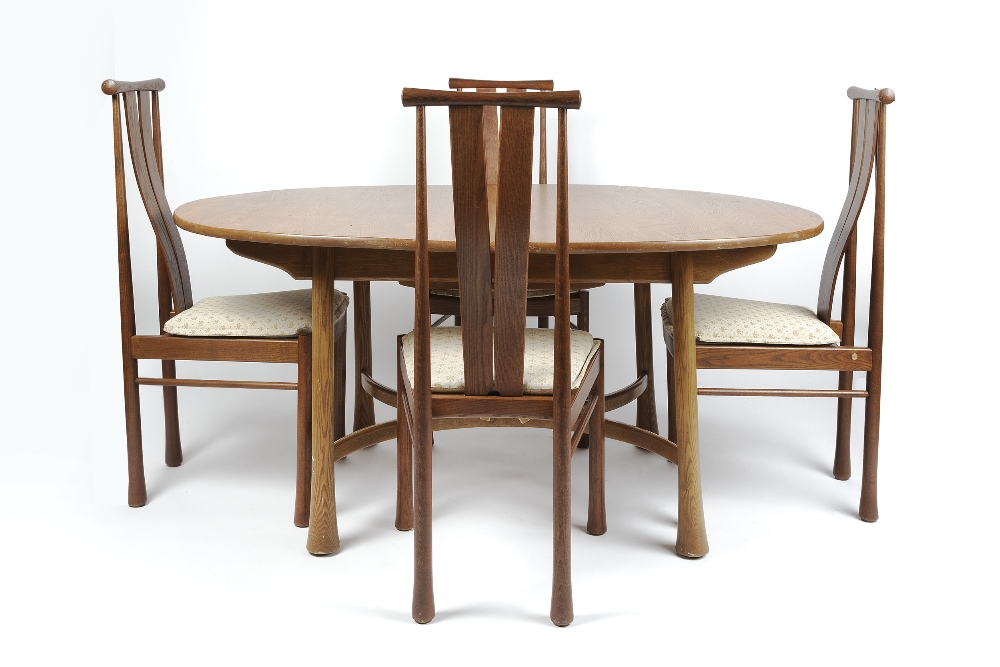 Ercol Saville dining table and six chairs in the 'Darker Golden Dawn' finish (matched set) chairs