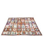 Vintage patchwork quilt with bird of paradise binding and backing 186cm wide x 206cm long