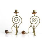 In the manner of W.A.S. Benson (1854-1924) pair of candlesticks, circa 1900, brass and copper, swirl