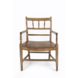 Arts and Crafts armchair, ash and elm 92cm high overall Provenance: Label to reverse of the chair